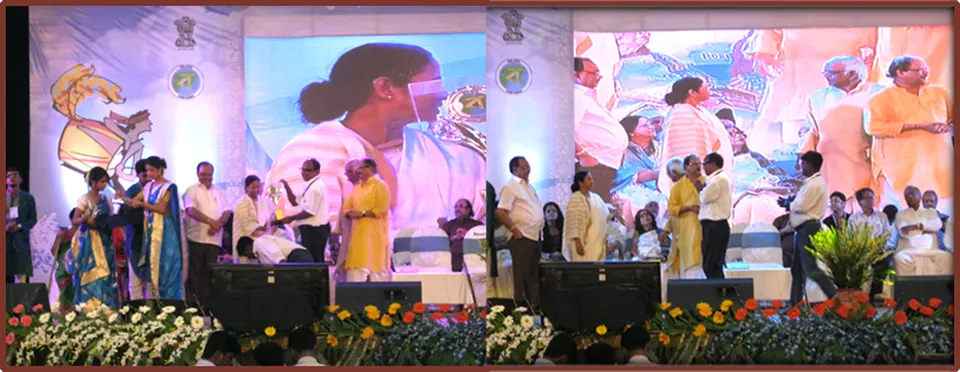 Receiving the award on stage — Biswa Bangla Sharad Samman 2013